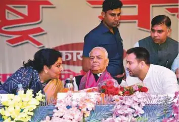  ?? PTI ?? Former Union Finance Minister Yashwant Sinha with RJD leader and former Deputy Chief Minister of Bihar Tejaswi Yadav and Congress leader Renuka Chowdhary during a meeting in Patna.