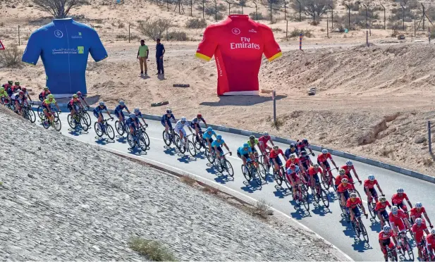  ?? — AFP ?? The peloton during the third stage of the Dubai Tour on Thursday. British rider Mark Cavendish won the third stage, but Elia Viviani is now the overall leader of the Tour.