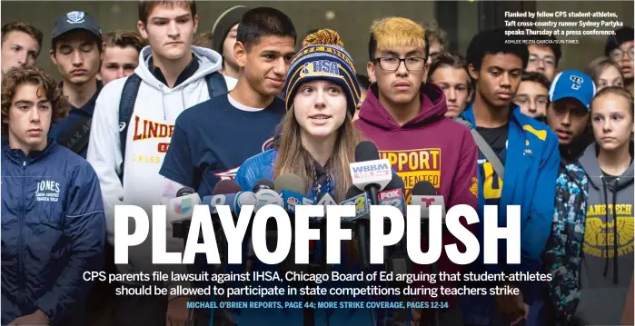  ?? ASHLEE REZIN GARCIA/SUN-TIMES ?? Flanked by fellow CPS student-athletes, Taft cross-country runner Sydney Partyka speaks Thursday at a press conference.