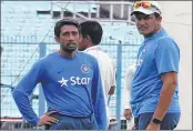  ??  ?? Wriddhiman Saha with then coach Anil Kumble