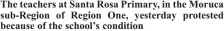  ??  ?? The teachers at Santa Rosa Primary, in the Moruca sub-Region of Region One, yesterday protested because of the school’s condition