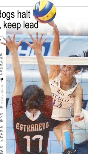  ?? JOVEN CAGANDE ?? Ateneo’s Jhoana Maraguinot fires away a kill against Arielle Estranero of UP during their UAAP volleyball clash at the Filoil Flying V Center in San Juan.