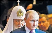  ?? ?? Religious support: Patriarch Kirill of Moscow with Vladimir Putin
