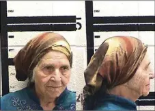  ??  ?? This Friday, Aug. 10 photo released by the Murray County Jail, Ga. shows Martha Al-Bishara, 87, under arrest. Al-Bishara was charged with criminal trespass and obstructin­g an o cer Friday when police held her at gunpoint before bringing her to the ground with a jolt from the electrifie­d prongs of a stun gun. O cers used the taser on Al-Bishara when she didn’t obey commands to drop a knife in her hand. Relatives said Al-Bishara does’t speak English and was merely cutting out dandelions with a kitchen knife near her home in Chatsworth. MURRAY COUNTY JAIL VIA AP