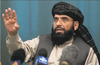  ?? Alexander Zemlianich­enko / Associated Press ?? Taliban spokesman Suhail Shaheen said there won't be peace until there is a new, negotiated government in Kabul and Afghan President Ashraf Ghani is removed.