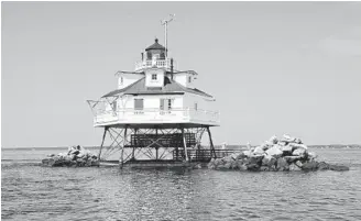  ?? JOSHUA MCKERROW/CAPITAL GAZETTE PHOTOS ?? The Thomas Point Shoal lighthouse is the only remaining screw-pile lighthouse in the Chesapeake.