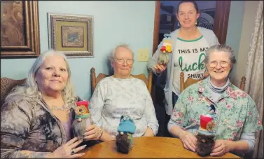  ?? PHOTO SUBMITTED ?? Members made gnomes out of recycled materials at the March meeting and some pretty cute and original gnomes were taken home. Members in the photo, from the left, include Joyce Britton, Mary Mueller, Melissa Lance (back) and Bonnie Leonard.