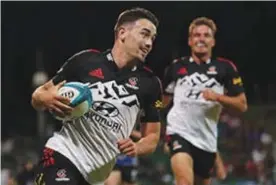  ?? Photo / Getty Images ?? Crusader Will Jordan crosses for one of his three tries.