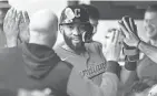  ?? KEN BLAZE/USA TODAY SPORTS ?? Guardians shortstop Amed Rosario celebrates after scoring on Saturday.