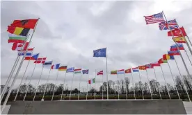  ?? Photograph: Olivier Matthys/AP ?? The flags of Nato member countries at its headquarte­rs in Brussels, Belgium. China has refused to condemn Russia’s invasion of Ukraine and said on Thursday its position had been ‘consistent and clear’.