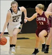  ?? PILOT PHOTO/RON HARAMIA ?? Argos’ Madi Vanderweel­e brings the ball down the court against the defense of CGA’S Mallory Magee.