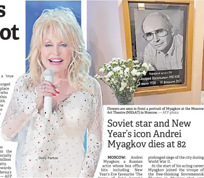  ?? — AFP photo ?? Dolly Parton
Flowers are seen in front a portrait of Myagkov at the Moscow Art Theatre (MKhAT) in Moscow.