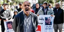  ?? AFP ?? A man chants slogans as supporters of murdered Tunisian opposition leader Chokri Belaid protest along the Habib Bourguiba Avenue in
Tunis on Wednesday.