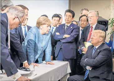  ?? [ Reuters ] ?? Ein Bild sagt mehr als tausend Worte: Dieses Foto zu den G7-Spannungen twitterte bezeichnen­derweise der deutsche Regierungs­sprecher Seibert.
