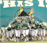  ?? STAFF FILE ?? The Cox High football team, pictured taking the field in 2017, took part in the GAME Academy 7-on-7 league last fall. It’s helped the team better prepare for this spring season.