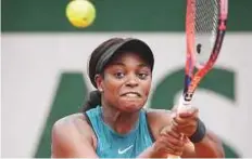  ?? AFP ?? Stephens powers a backhand to Italy’s Camila Giorgi during their women’s singles third round match.