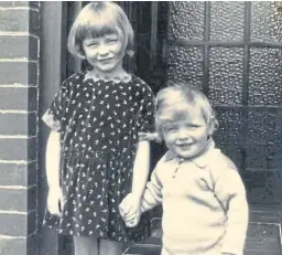  ??  ?? Stuart Bannerman, aged 18 months, with his sister Athena outside the home where he still lives.