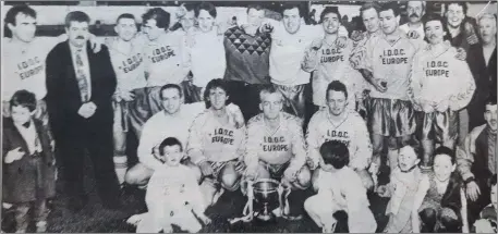  ??  ?? The victorious Enniskerry YC team with mentors and supporters after their dramatic victory over Little Bray United.