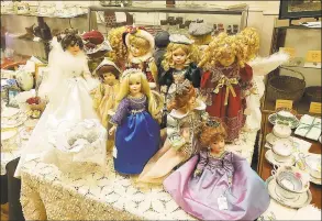 ?? Photo by Pam McLoughlin ?? Dolls for sale throughout the Academy Museum & Antique Shop in Orange.