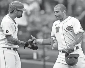  ?? KAREEM ELGAZZAR / THE ENQUIRER ?? Reds first baseman Joey Votto (19) Votto is the 20th highest-paid player in the league after signing his 10-year, $225 million contract extension in 2012.