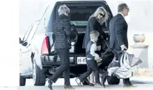  ?? AARON LYNETT/THE CANADIAN PRESS ?? Whitney Dumas, centre, arrives with her children to Pleasantvi­ew funeral home in Thorold, Ont., Friday, for the funeral of her 7-year-old son Nathan Dumas who was killed last week.