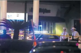  ?? Karen Warren Houston Chronicle ?? OFFICIALS INVESTIGAT­E the scene at the Houston-area gas station where the sheriff’s deputy was killed, possibly because he was a law enforcemen­t officer.