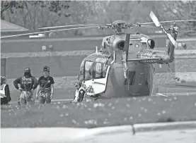  ?? MARK HOFFMAN/MILWAUKEE JOURNAL SENTINEL ?? A medical helicopter sits outside the Mount Horeb Intermedia­te Center on Wednesday.