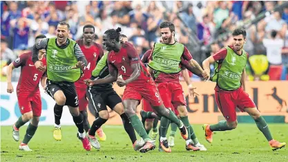  ??  ?? Portugal’s Eder, No.9, celebrates after scoring against France in the Euro 2016 final.