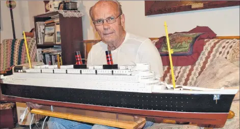  ?? ERIC MCCARTHY/JOURNAL PIONEER ?? Model ship hobbyist Thiren Smallman displays one of his models at his home in O’Leary.