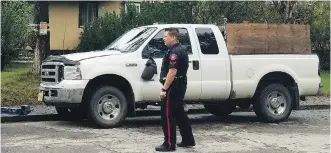  ?? PHOTOS: DAVID MOLL/ CALGARY HERALD ?? A mall employee, top, sweeps up following a smash and dash that occurred early Thursday morning at North Hill mall as police investigat­e the abandoned truck believed to be involved.