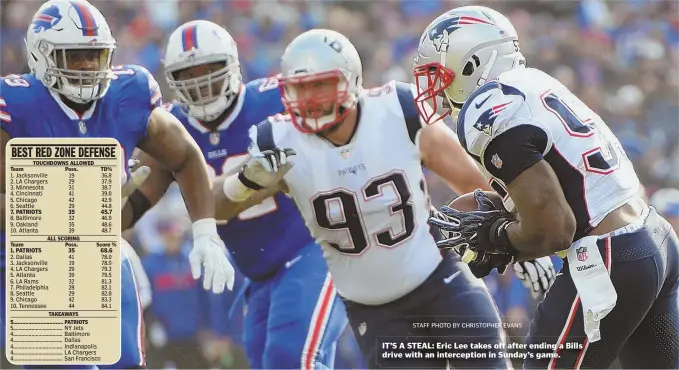  ?? STAFF PHOTO BY CHRISTOPHE­R EVANS ?? IT’S A STEAL: Eric Lee takes off after ending a Bills drive with an intercepti­on in Sunday’s game.