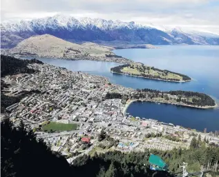  ?? PHOTO: REUTERS ?? An aerial shot of Queenstown. A local property manager said current rental prices were ‘‘survival rates’’ as owners tried to set affordable prices.
