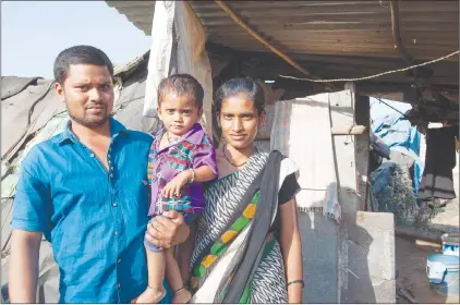  ?? CP PHOTO ?? Moulali Mohammed, who works for the pharmaceut­ical company Virchow, is shown with his wife and son near Hyderabad, India, on April 24.