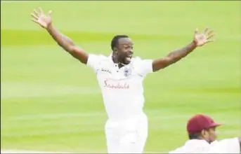  ??  ?? Fast bowler Kemar Roach claimed two wickets for West Indies.