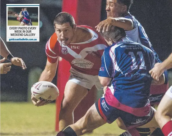  ?? Picture: JERAD WILLIAMS ?? Currumbin's Jarrod Gill takes on the Runaway Bay defence in the clash at Bycroft Oval.