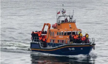  ?? Photograph: Chris J Ratcliffe/Getty Images ?? Migrants are brought into Dover by the RNLI after being picked up in the English Channel. ‘Re-establishi­ng safe and legal routes for people seeking refugee status is an essential first step.’