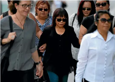  ?? PHOTO: FAIRFAX NZ ?? Merzabeth Tagpuno (centre), the mother of New Zealand woman Warrienna Wright, arrives at the Supreme Court in Brisbane for the trial of Gable Tostee, who was acquitted of Wright’s murder and manslaught­er.