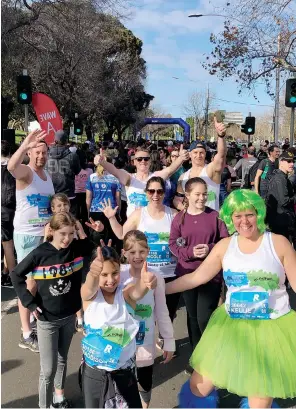  ??  ?? Gathered together in their Beat the Blues Gippsland gear for Run Melbourne are Mark Phillips, Jeremy Freeth, Peter Clark, Kellie Phillips and Nicole Freeth (front) with kids Maddison Clark, Liam Phillips, Mila Phillips, Amelia and Eleanor Freeth.