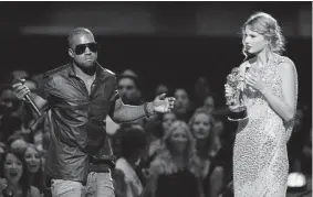  ?? Jason Decrow, AP file ?? Singer Kanye West takes the microphone from singer Taylor Swift as she accepts the Best Female Video award during the MTV Video Music Awards on Sept. 13, 2009, in New York.