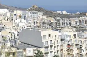  ?? ?? Gozitans fear that large-scale developmen­ts are changing the face of the island. FILE PHOTO: MATTHEW MIRABELLI