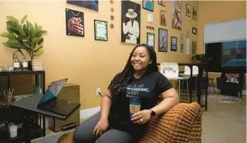  ?? MIAMI HERALD ?? Above: Joy St. Clair, 37, is the founder of Co-Space. Below: Patricia Laurenceau, a web designer who found Co-Space on Instagram, works at the co-working space on Jan. 11 in Miami Gardens. Before finding the space, she floated around wherever she could find a place to work.