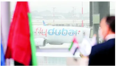  ?? AP ?? A welcoming ceremony is held for the first arrival of a Flydubai commercial flight to Israel, at Ben-Gurion Internatio­nal Airport, Israel, on November 26, 2020. Dubai-based budget carrier FlyDubai saw record profits of $572 million in 2023, boosted by carrying the most passengers ever across its network, the company announced yesterday.