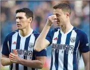  ??  ?? WHAT A STINKER: Gareth Barry and Jonny Evans, two of West Brom’s ‘Cab Four’, reflect on the defeat