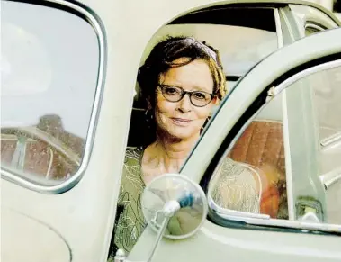  ?? AMY HARRITY THE NEW YORK TIMES ?? Anne Lamott, pictured in her 1959 Volkswagen Beetle, has published her 12th collection of faith-based essays.