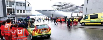  ??  ?? The cruise ship Viking Sky, that ran into trouble in stormy seas off Norway, reaches the port of Molde under its own steam. — AFP photo