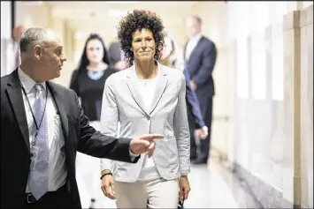  ?? MATT ROURKE / GETTY IMAGES ?? Andrea Constand walks to the courtroom Tuesday for the trial of Bill Cosby on sexual assault charges at the Montgomery County Courthouse in Norristown, Pa. Constand testified that Cosby drugged and molested her in 2004.