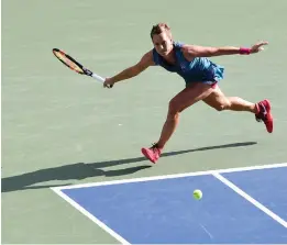  ??  ?? Czech Republic’s Barbora Strycova goes for a shot against Johanna Konta of Britain in their women’s singles second round match at the Pan Pacific Open in Tokyo on Thursday. Strycova won 7-5, 7-6. —