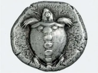  ??  ?? Silver coin of Aegina island featuring a sea turtle (470/465-445/440 BC). The exhibition comprises 85 pieces that come mainly from the Alpha Bank collection, and 159 other objects from 32 museums in Greece, Italy, France and the UK. It is arranged in...