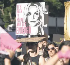  ?? — AFP photo ?? Supporters of the FreeBritne­y movement rally in support of Britney for a conservato­rship court hearing, outside the Stanley Mosk courthouse in Los Angeles, California.