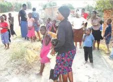  ?? ?? Residents of Federation Phase One struggle to come to terms with the discovery of the clay plate (mbiya) inscribed with their names recently